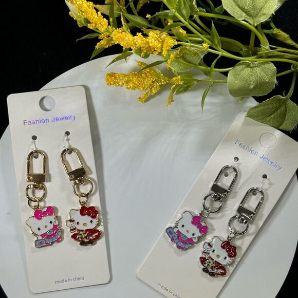 BAG CHARM Hello Kitty Set of 2 Gold Tone Pink And Red Charm Keychain Bag Charm - Picture 3 of 4